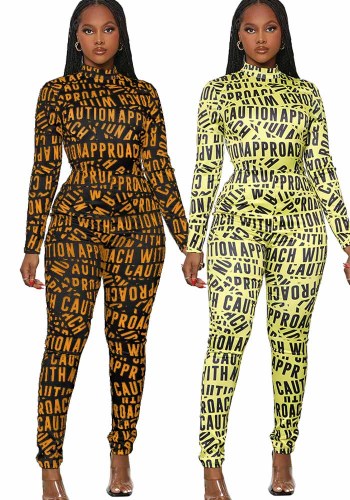All Over Letter Print High Neck Zipper Fitted Jumpsuit