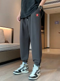 高品質 バレンシアガ 偽物通販 赤い丸印アルファベットロゴプリントのカップル向けパンツ