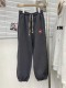 高品質 バレンシアガ 偽物通販 赤い丸印アルファベットロゴプリントのカップル向けパンツ