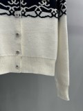 【話題商品！】シャネル コピー 撞色ダブルCジャカードオーダーボタン丸首長袖ニットカーディガンコート2色