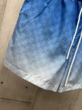 追跡付 グッチ 激安偽物 の青のグラデーションがたっぷりプリントされたダブルGアルファロゴブルーのドローストリングビーチパンツ