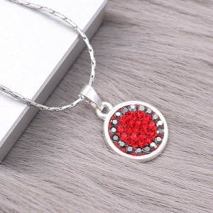 Pendant with gray and red rhinestones
