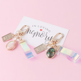 Symphony retro pink gemstone keychain personality alloy listing color belt accessories bag pendant