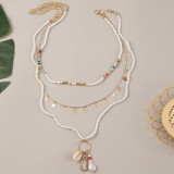 Bohemian multi-layer woven shell rice bead necklace European and American trend personality pearl pendant jewelry
