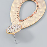 Geometric alloy diamond embedded water droplet shaped earrings