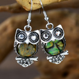 Irregular colored shell owl earrings