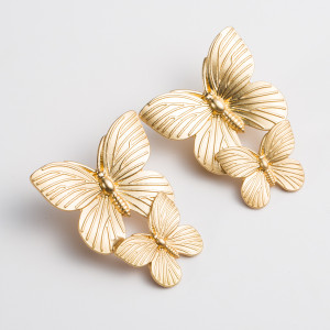Two butterfly alloy earrings