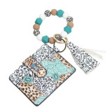 Leopard print change card case with printed beaded wood bead tassel keychain