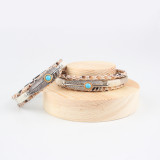 Handwoven feather leather bracelet