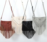 Riveted soft skin tassel bag, single shoulder diagonal span bag