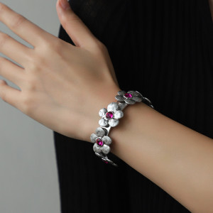 Flower opening alloy bracelet