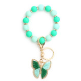 Fashion bracelet with colorful silicone bracelet, diamond keychain, butterfly pendant, silicone bead bracelet