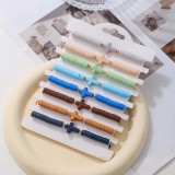 Bohemian Cross Bracelet Set of Eight Solid Color Soft Ceramic Elastic Bracelets