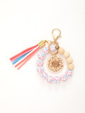 Summer vacation style, fresh and colorful wooden bead bracelet, keychain, tassel wood chip pendant, car bag pendant