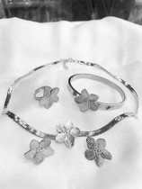Stainless steel flower earrings, bracelets, necklaces, rings, four piece set