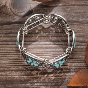 Bohemian style hollowed out turquoise carved bracelet