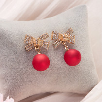 Christmas earrings with bow, round beads, and diamond studded earrings