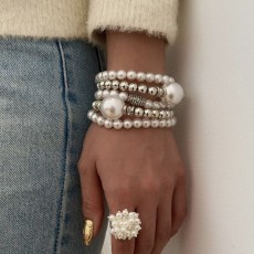 Exaggerated pearl studded diamond layered bracelet set