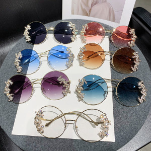 Frameless cut edge inlaid diamond sunglasses, fashionable round rhinestone sunglasses with wave design