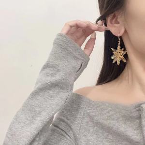 Christmas gold three-dimensional snowflake earrings