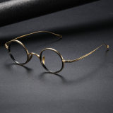 LE0373 Titanium Circle Glasses: Gold and Gray Elegance