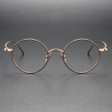 Sophisticated Rose Gold Titanium Round Glasses - LE0405