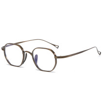 Sleek Bronze Elegance: Titanium Optical Geometric Glasses LE0363 Sleek Bronze Elegance: Titanium Optical Geometric Glasses LE0363