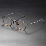 Olet Optical LE0278 rectangular glasses in brown and silver, featuring a screwless design and adjustable nose pads for a comfortable, hypoallergenic fit.
