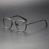 Olet Optical LE0409 gunmetal round titanium glasses, featuring adjustable nose pads and a lightweight design, ideal for comfort and daily wear.
