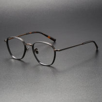 Bronze & Black Round Titanium Glasses LE0409 - Elegant & Lightweight Design Bronze & Black Round Titanium Glasses LE0409 - Elegant & Lightweight Design