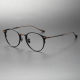 Black Circle Glasses LE0413 - Round Titanium Frames with Bronze Arms
