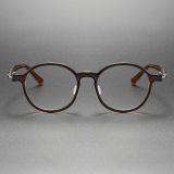 Brown Glasses LE0455 - Round Transparent Brown Titanium Frames for a Unique Look