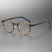 Round Tortoise Shell Glasses LE0248 in Black | Elegant & Lightweight Design