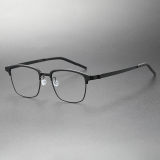 Olet Optical's LE0258 black frames glasses, featuring a screwless design and a durable titanium browline structure that offers high flexibility, impact resistance, and hypoallergenic properties.
