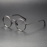 Olet Optical's LE0408 gunmetal glasses, featuring subtle grey accents on a titanium frame for sophisticated style and hypoallergenic comfort.


