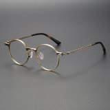 Olet Optical's LE0459 big frame glasses in luxurious gold with tortoiseshell temple tips and ivory nose pads, designed for comfort and hypoallergenic wear.

