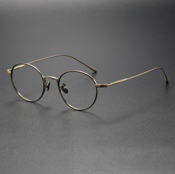 Round Gold Glasses LE0410 - Elegant Black & Gold Titanium Design