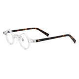 Olet Optical LE3014 Clear glasses with TortoiseShell accents, lightweight acetate round glasses, hypoallergenic and durable with a transparent frame and tortoise shell temples.

