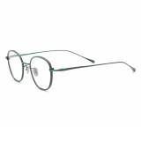 Olet Optical LE3048 green and gunmetal titanium eyeglasses with large square frames, featuring a textured surface design and adjustable nose pads for enhanced comfort.

