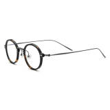 TortoiseShell circle frame glasses by Olet Optical, model LE0563 with Gunmetal titanium temples

