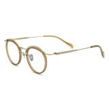 Olet Optical gold circle glasses LE0679 featuring hypoallergenic IP plating, lightweight titanium frame, and round design.

