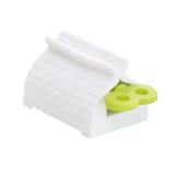 1 Pc Rolling Tube Toothpaste Squeezer Toothpaste Seat Holder Stand Rotate Toothpaste Dispenser for Bathroom
