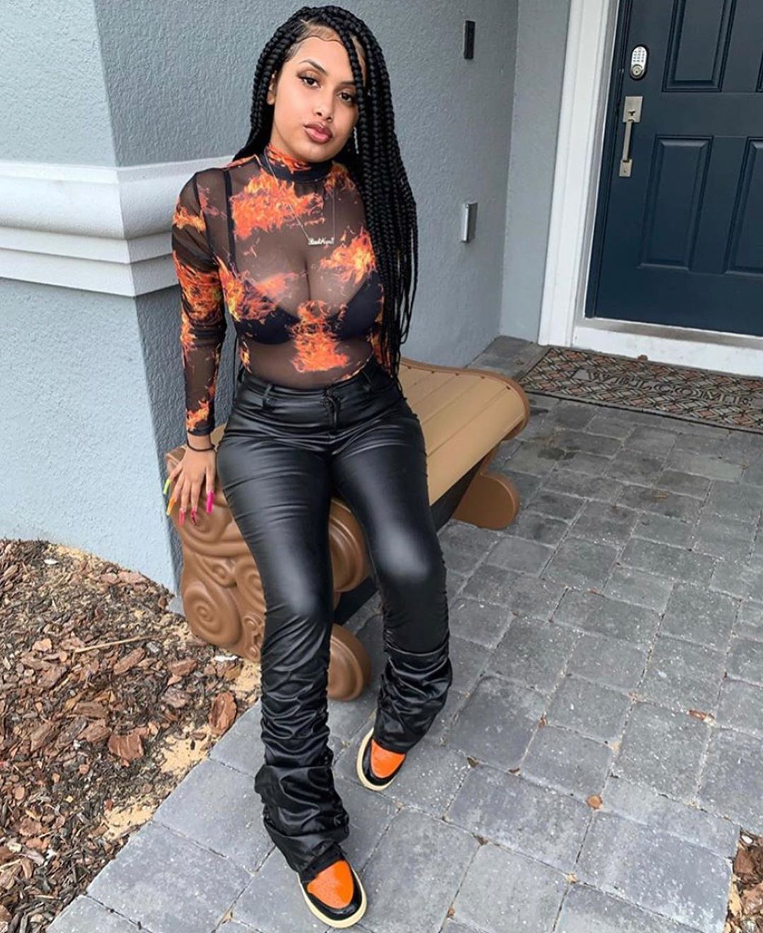 black stacked leather pants