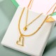 Brass Charm Multilayered Necklace