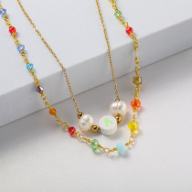 collar en doble cadena con perla natural y charm blanco piedras