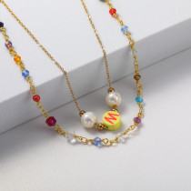 collar en doble cadena con perla natural y charm piedras