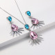 juego de collar y aretes plateada con piedra rosa