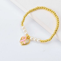 pulseras aesthetic Oro Laminado con Dije de corazon rosado y perlas