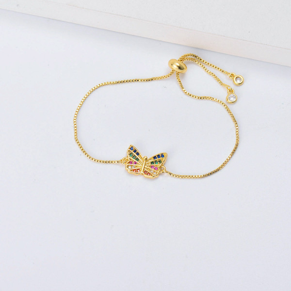 pulsera de oro 18 con mariposa de colores