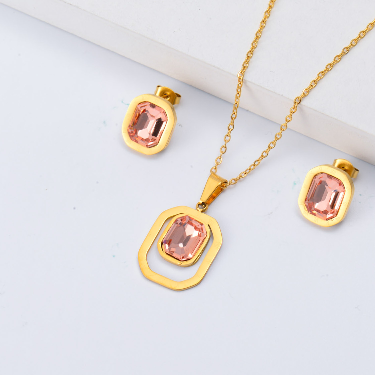juego de collar y aretes acero inoxidable con numero romano y piedra